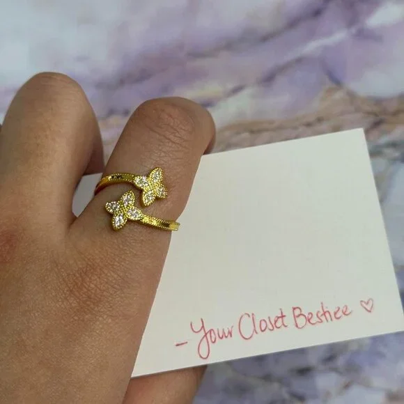 Gold color adjustable 4 leaf clover ring, about a size 7. NEW. Adjustable. - Picture 1 of 5